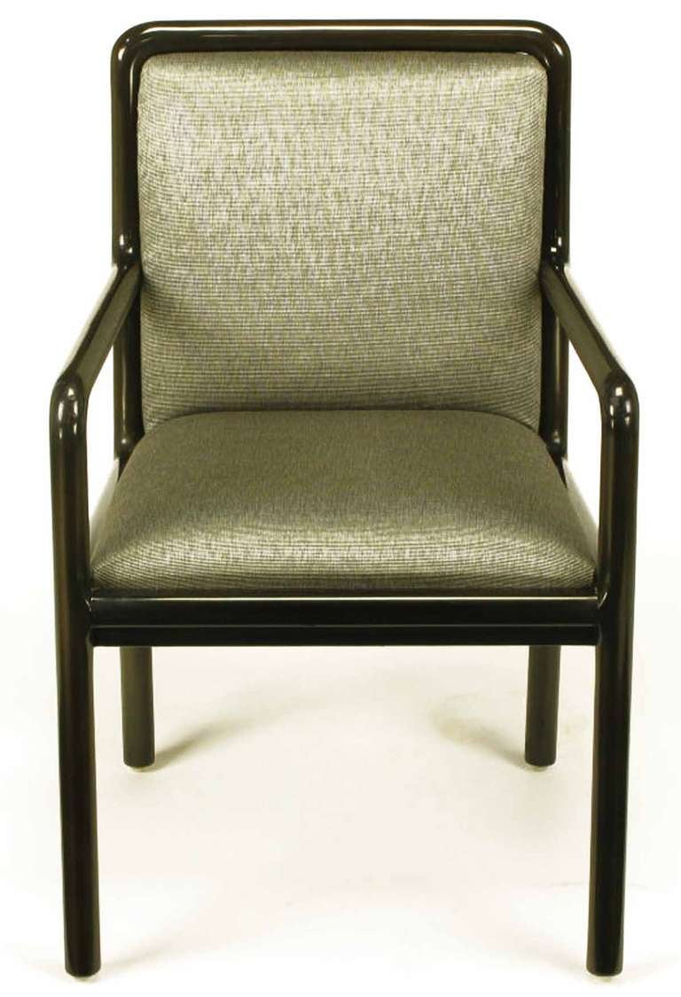 Four Martin Brattrud Ebonized & Upholstered Arm Chairs.