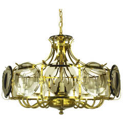 Twelve-Arm Brass Chandelier with Smoked Glass Disc Lenses 11