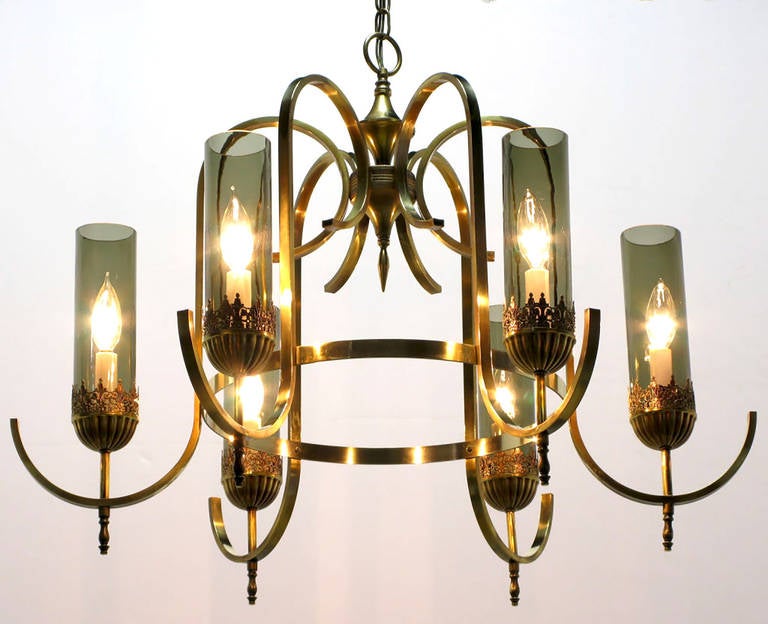 American Brass Undulate Arm Six-Light Chandelier with Smoked Hurricane Shades For Sale