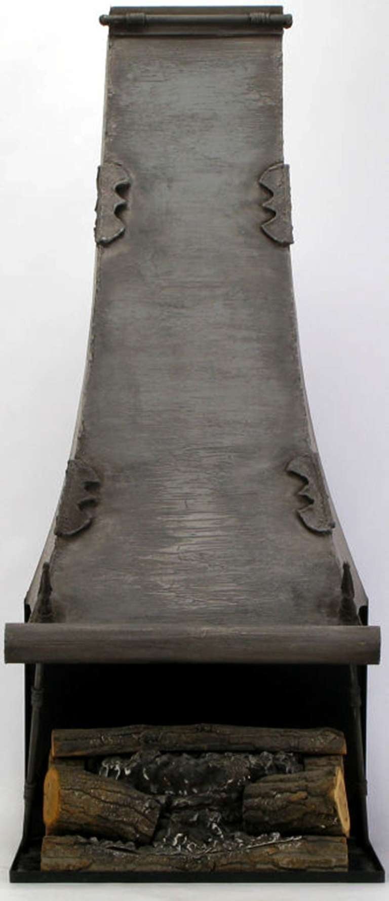 Spanish revival hammered iron and black lacquered steel fireplace with Gothic spear details. Comes with wood logs. For decorative use only. Can be hung on a wall or placed on stone or brick plinth.