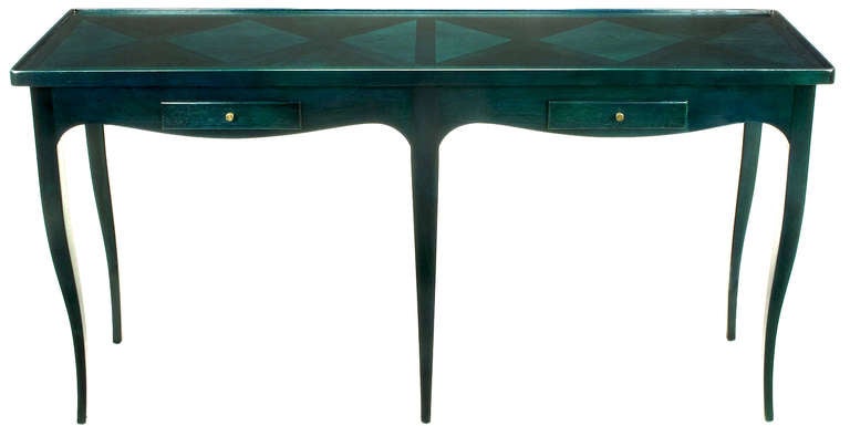 Jacques Bodart console table with diamond pattern parquetry top and sleek cabriole legs. Lipped border surrounds top surface, a pair of petite drawers with brass stud pulls.  Newly finished in a transparent blue-green that allows the grain to bee