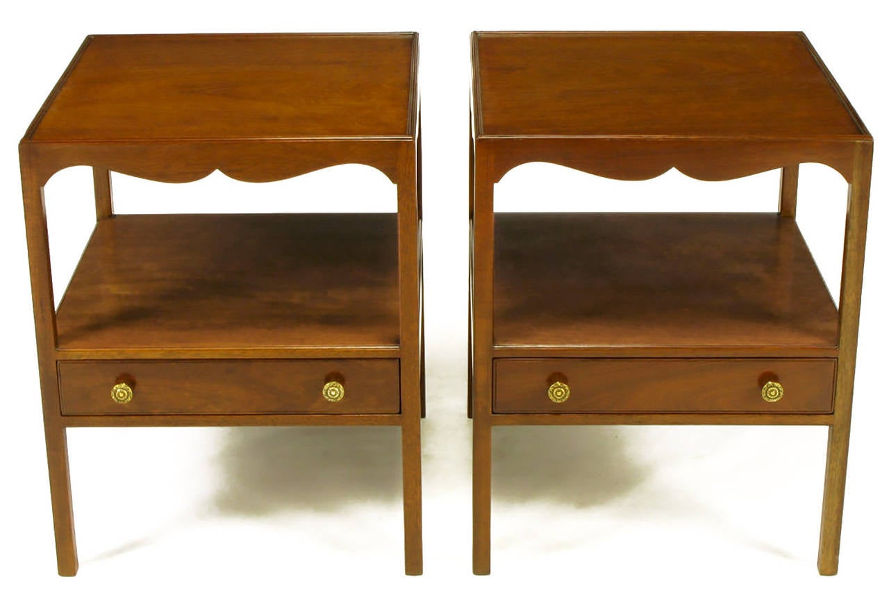 Pair of Kittinger transitional style mahogany night stands with scalloped four sided apron and beaded border top. Open center with lower single drawer. Solid brass pulls. Expertly crafted and fully restored.