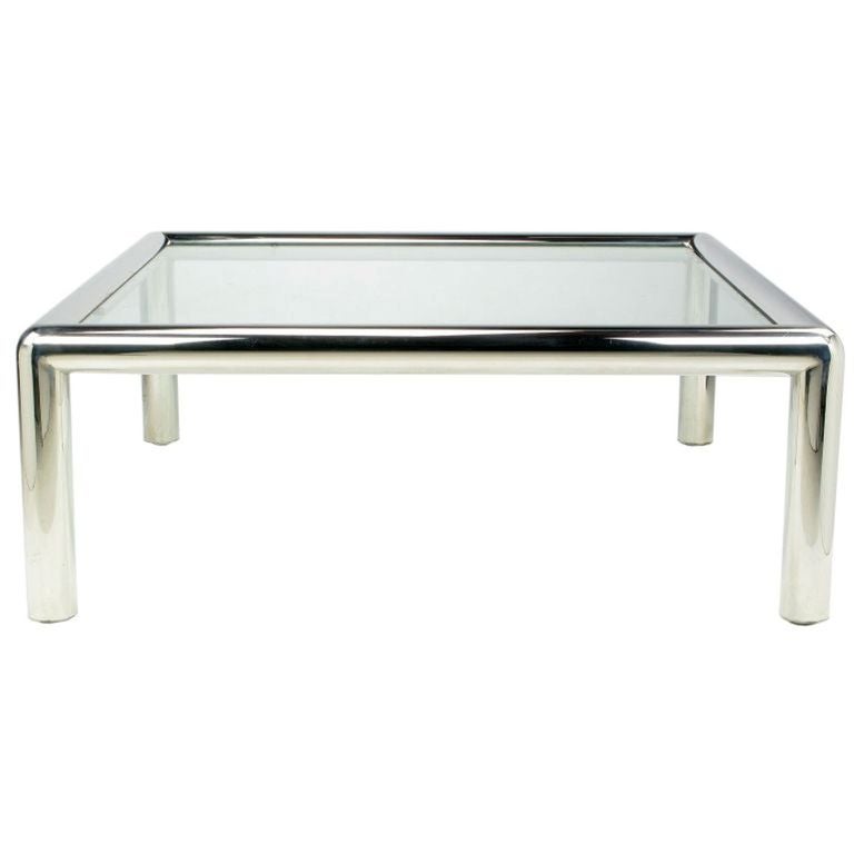 Polished aluminum cocktail/coffee table by designer John Mascheroni for Vecta. Seamless design with out a single visible joinery line. Appears as chrome. Inset 3/8