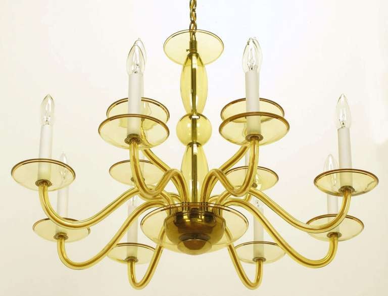 1940's Murano light gold color glass chandelier, with hand painted gold accents. Has two tiers, the lower with eight arms, and the upper with four.  Sold with brass chain and canopy.