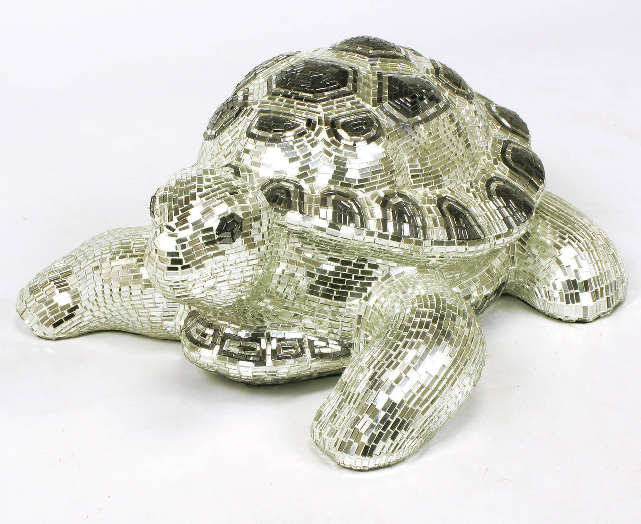Tessellated sliver and black mirror tortoise sculpture. Plaster cast tortoise with thousands of tiny mirrored tiles. Lifesize at 18
