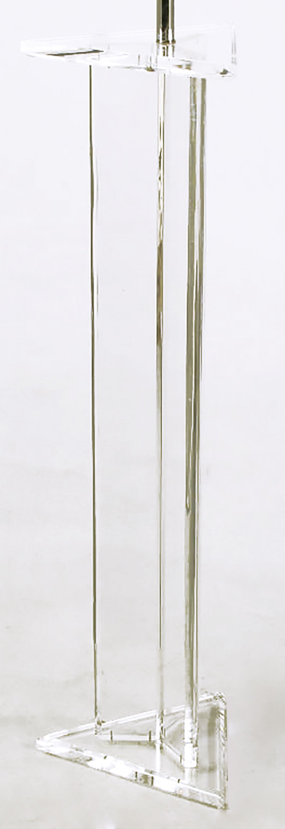 Triangular bevelled Lucite base and cap floor lamp with three-part trefoil Lucite body. Chrome stem and socket. Sold sans shade.