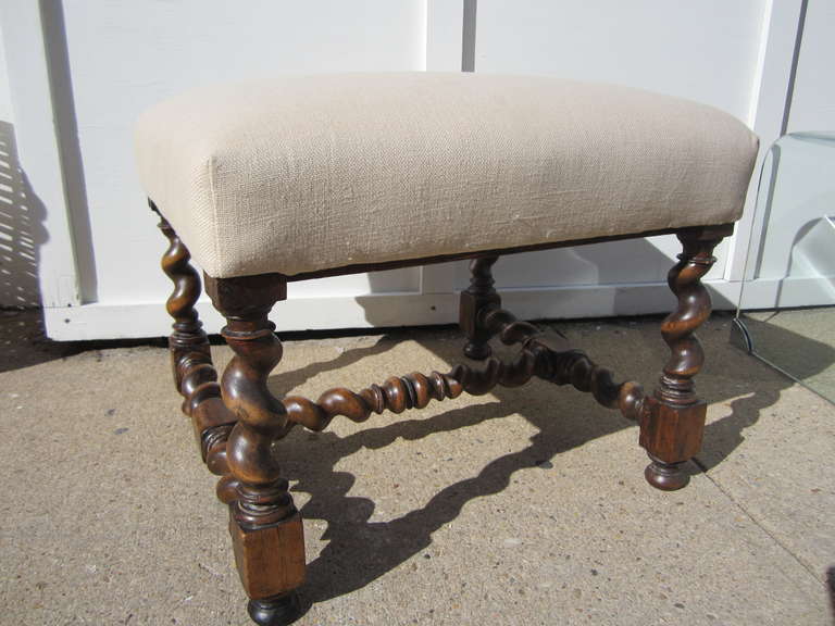 Handsome walnut barley twist bench with newly reupholstered Belgian linen seat.......