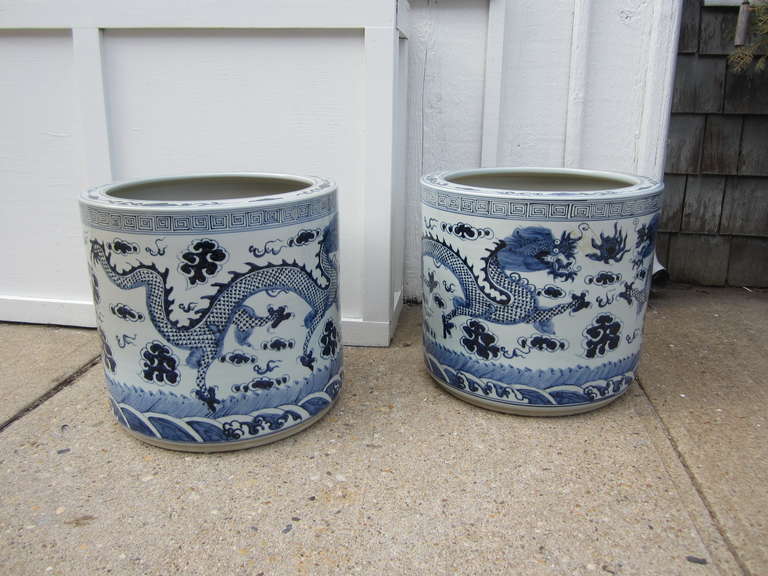 Large pair of Chinese blue and white cylinder planters with dragons......