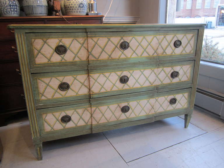 Very elegant green, yellow, and off-white lattice painted Louis XVI style 3 drawer chest of drawers.....an exceptional looking piece!