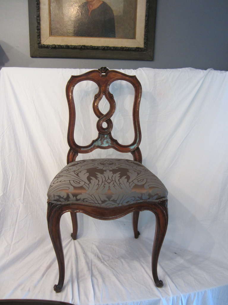 Elegant Classical Italian side chair with rich French polish and brown and blue damask upholstered seat.
