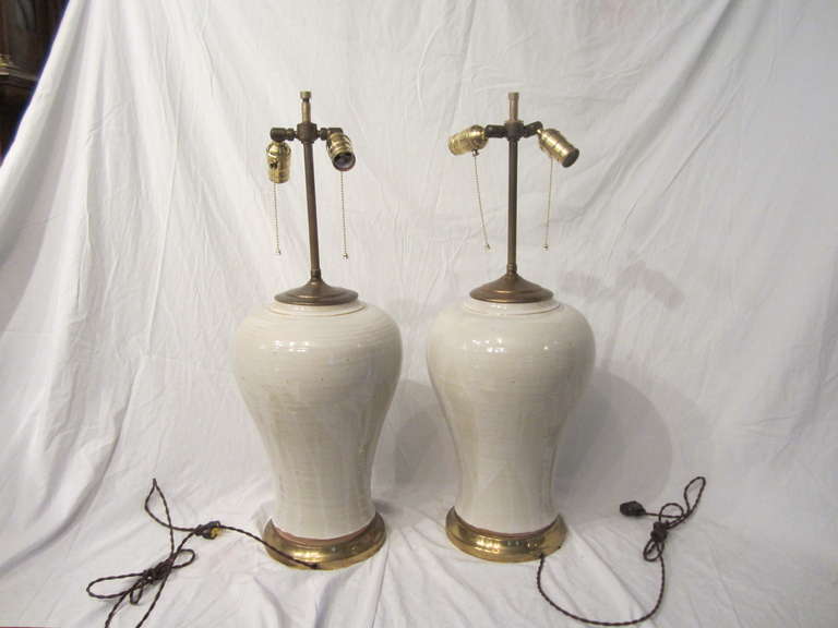 Great pair of white glazed ceramic lamps newly electrified with brown silk cord.