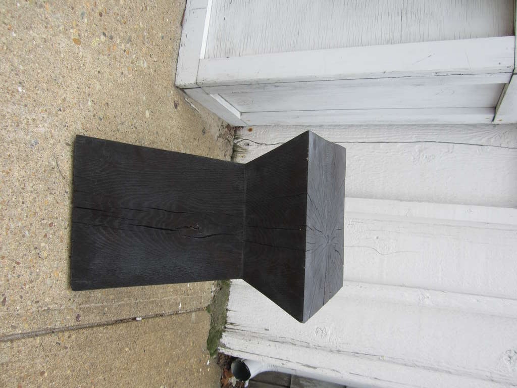 Pair of ebony stained oak occasional tables from Holly Hunt....