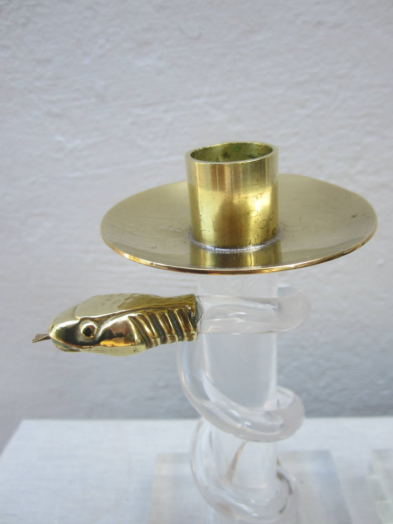 Exotic pair of Lucite and brass snake candlesticks by Allesandro Albrizzi.