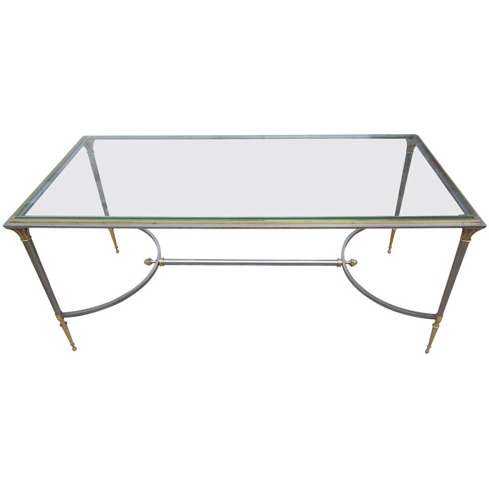 Elegant steel and bronze Maison Jansen coffee table with a new mirror glass top.