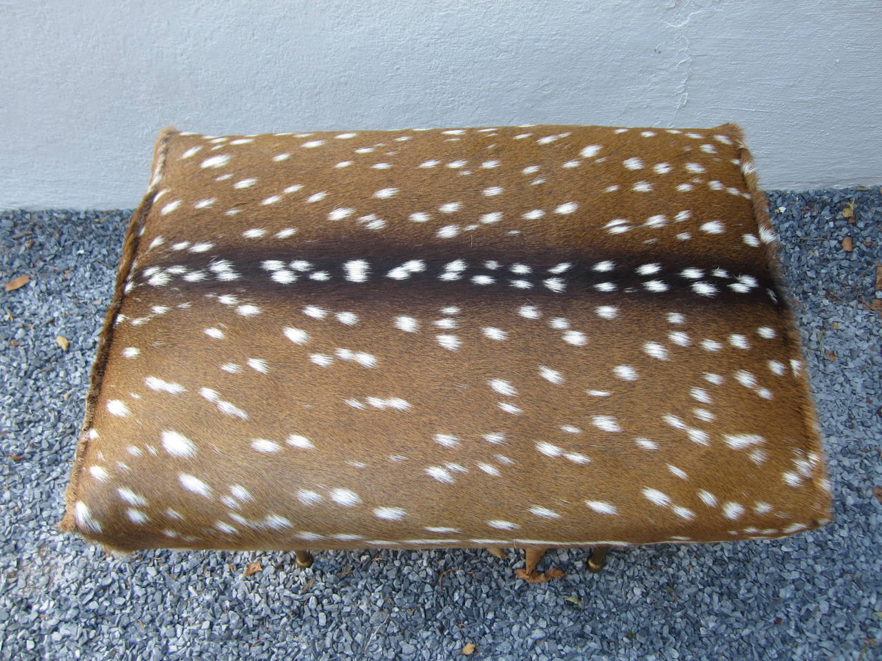 Modernist style bench with metal Italianesque modern legs, upholstered in dappled deer hide.