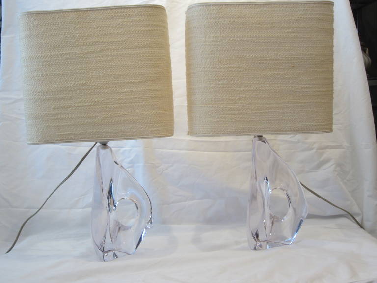 Wonderful pair of modern amorphic crystal lamps made and signed by Michel Daum.....original shades......both signed Daum France on bases....Lamp height to socket is 12