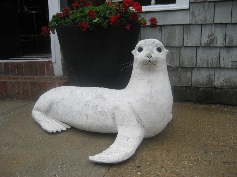 Adorable and whimsical papier mache white seal