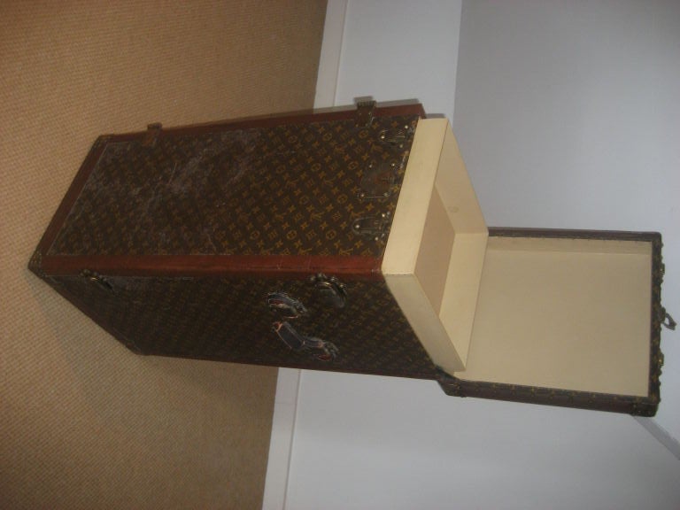 Unique Vuitton wardrobe case that unlocks to a chest of drawers....