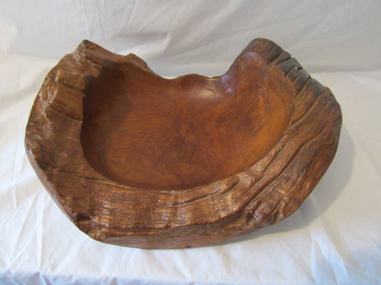 Rustic, richly textured bowl presents irresistible organic sophistication. This handcrafted bowl is a beautiful decor piece.