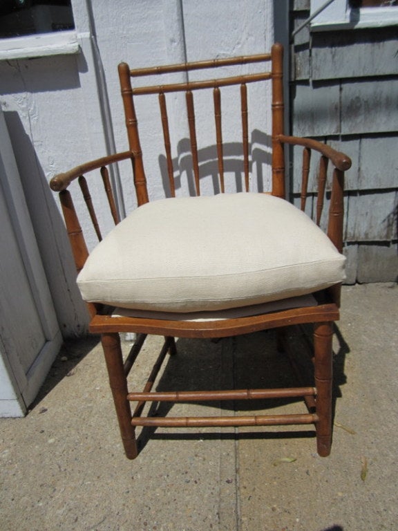 Wonderfully patinated petit arm chair with new Belgian linen down seat.