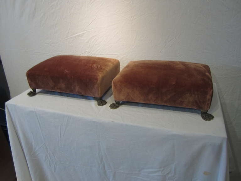 Luxurious pair of newly covered silk velvet footstools with bronze claw feet....principessa!