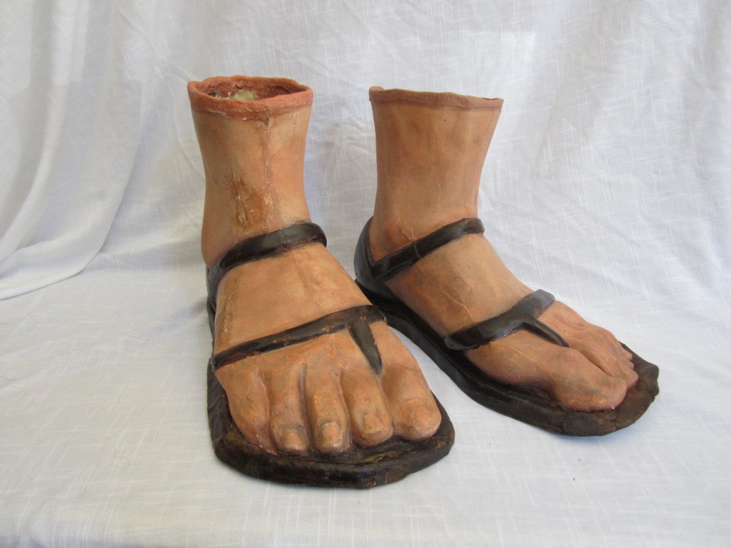 Large pair of papier mâché Italian feet with sandals. Slightly restored but in very good antique condition.