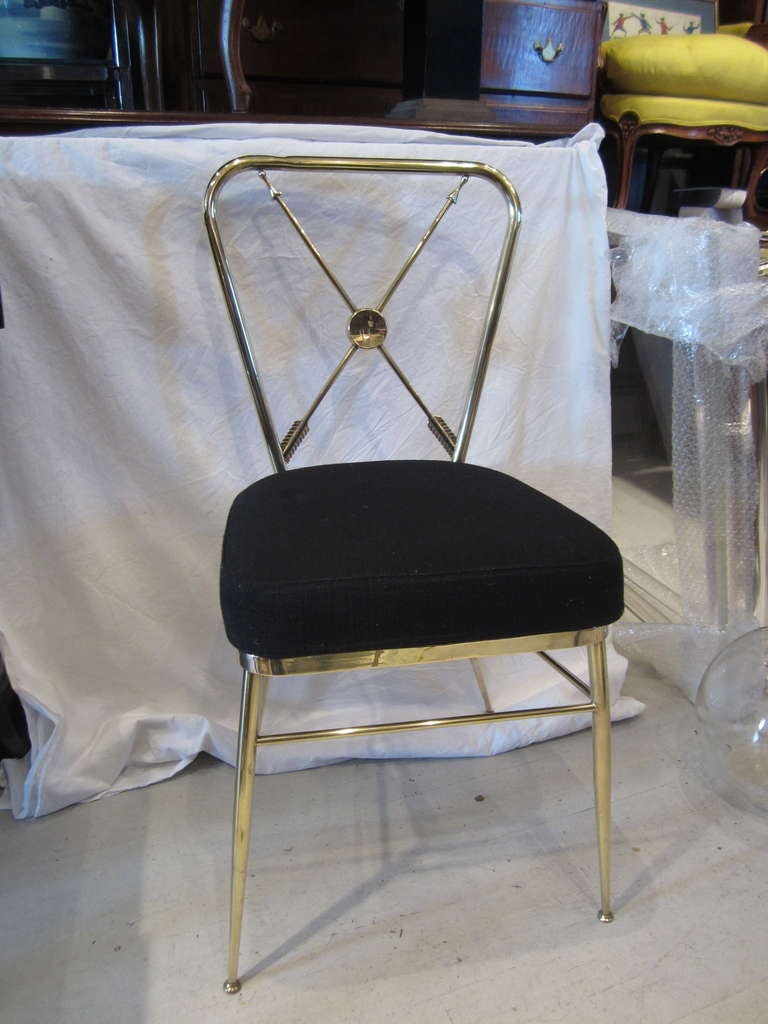 Brass compass chair by Gio Ponti.  Upholstered in original black wool.