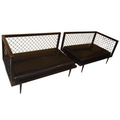 Pair of Jean Royere style  mid-century iron sofas 