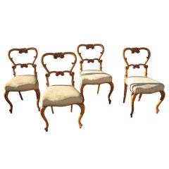 Set of four Continental maple chairs