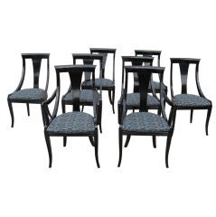 Set of 8 black lacquered chairs by Pietro Costantini