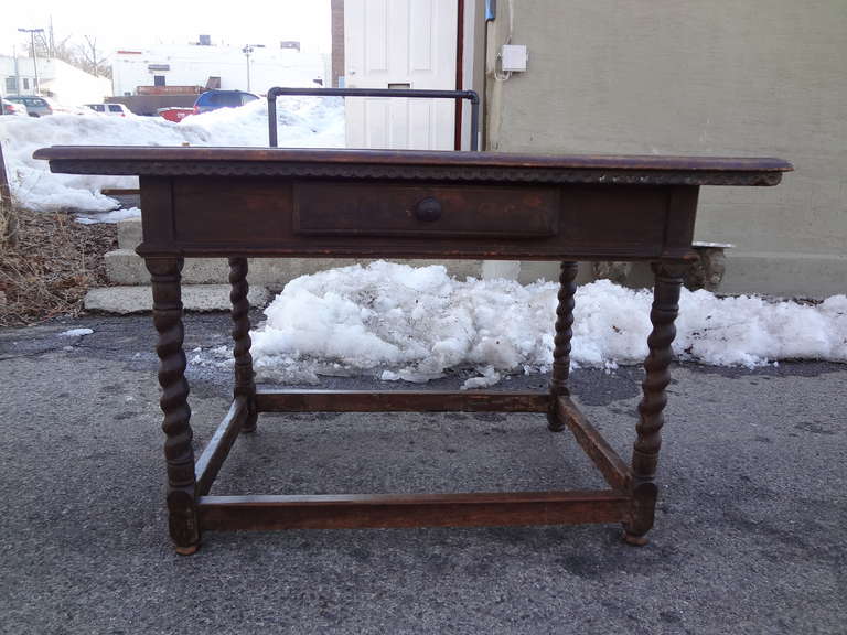 17th or very early 18th century Italian Walnut table with one drawer. I will give a detailed condition below but about as original table as can  be  found including  the little button feet and a two board top with one of the boards being  extremely