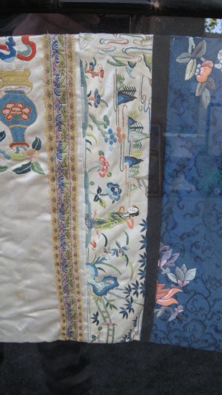 Chinese embroidered silk robe under glass 2