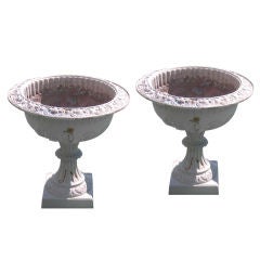 Pair of 19th century cast iron garden urns