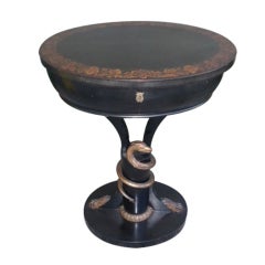 Regency style table with snake motif