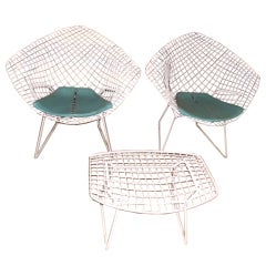 Pair of Bertoia for Knoll diamond armchairs and ottoman
