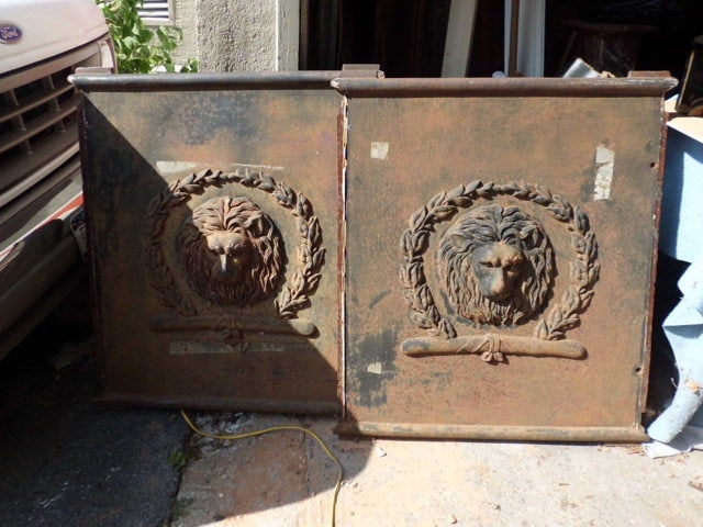 Pair of Large Cast Iron Plaques with Lion Motif