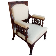 Aesthetic movement armchair with spider  web motif
