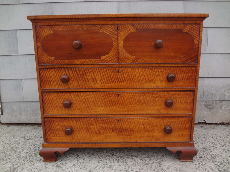 A beautiful and unusual federal chest of drawers