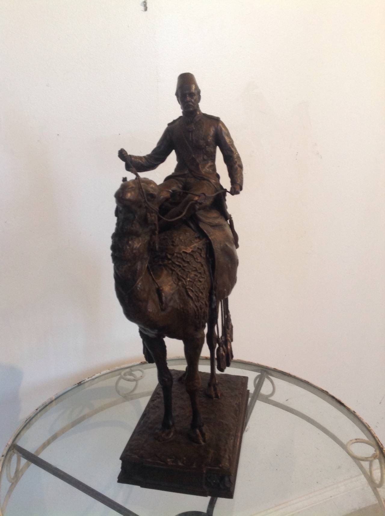 A rare bronze of General Gordon on Camel back by English sculptor Edward Onslow Ford ( 1852-1901) with a dark brown patina inscribed E. Onslow ford on the base.
This bronze is probably a maquette for the monument commemorating Major General Charles