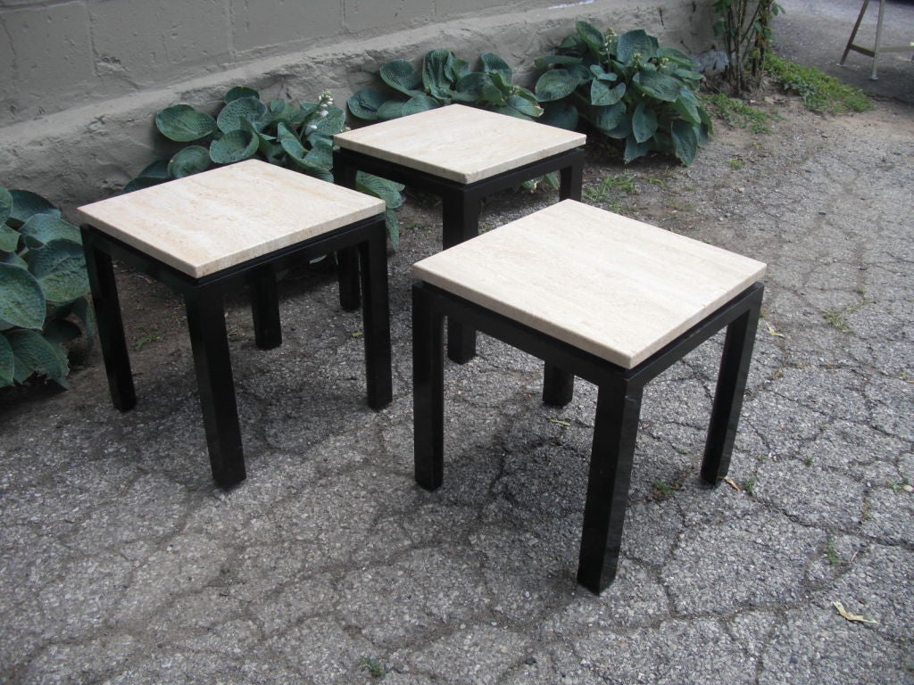 A set of 3 1950's Harvey Probber side tables with original travertine tops and painted black mahogany bases in 