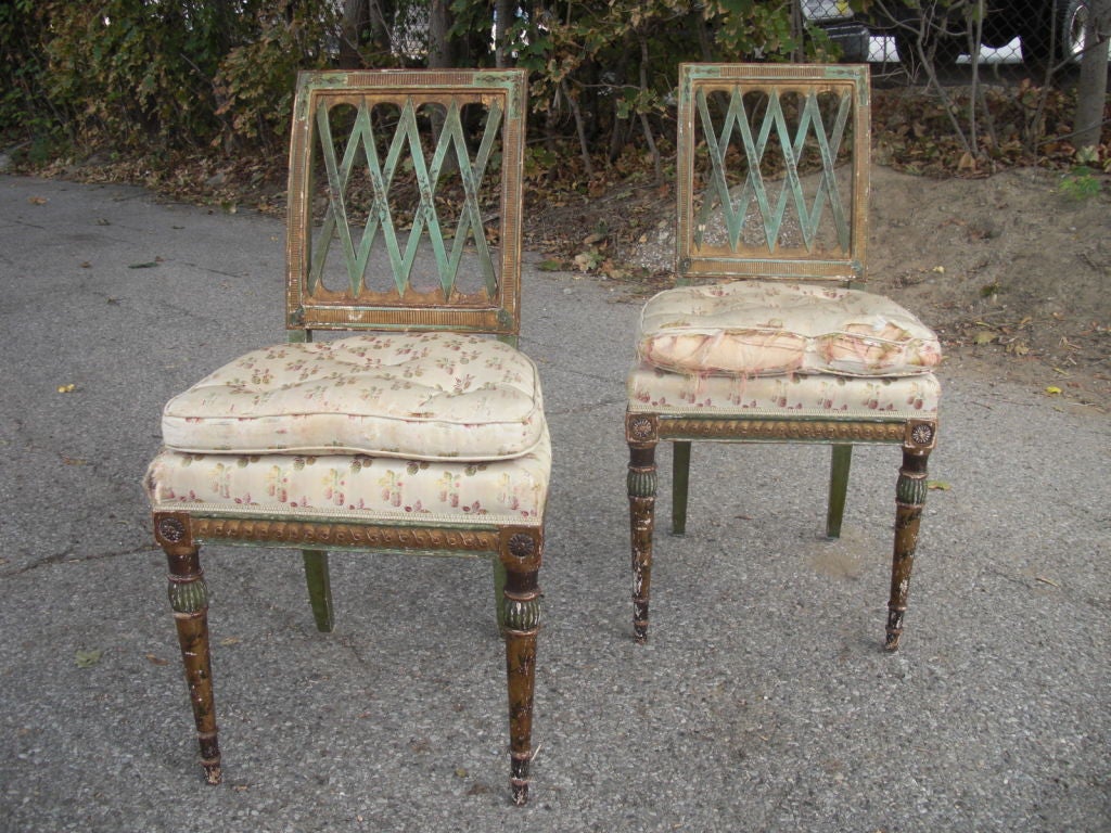 Pair of paint decorated side chairs circa 1790