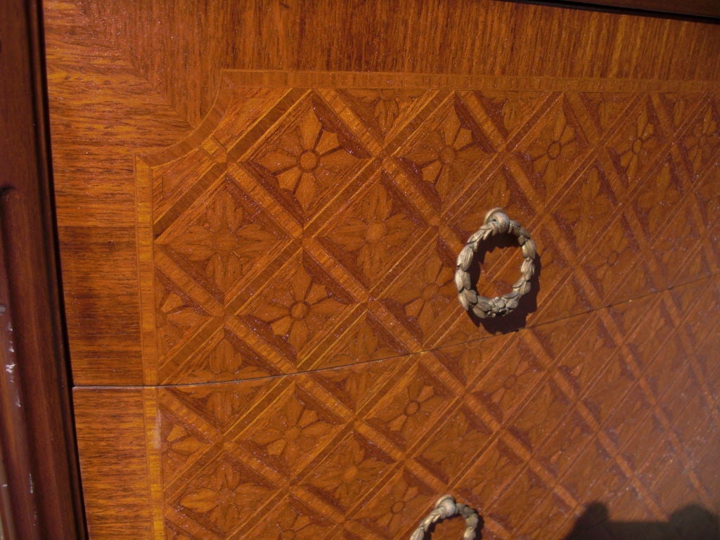 Louis XVI style marquetry ormolu mounted commode