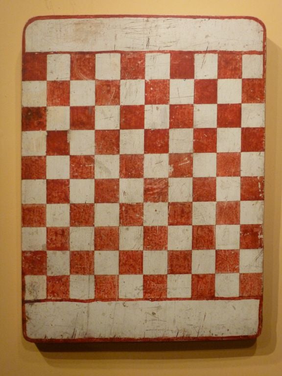 Bold graphic gameboard in original tomato red and white paint on extra thick board.  Wonderful old worn surface.