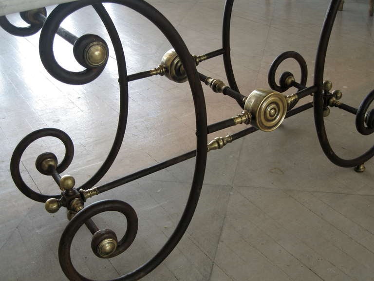 Victorian A French Bakers Table with white Marble Top  and Cast Iron Base, Circa 1880.