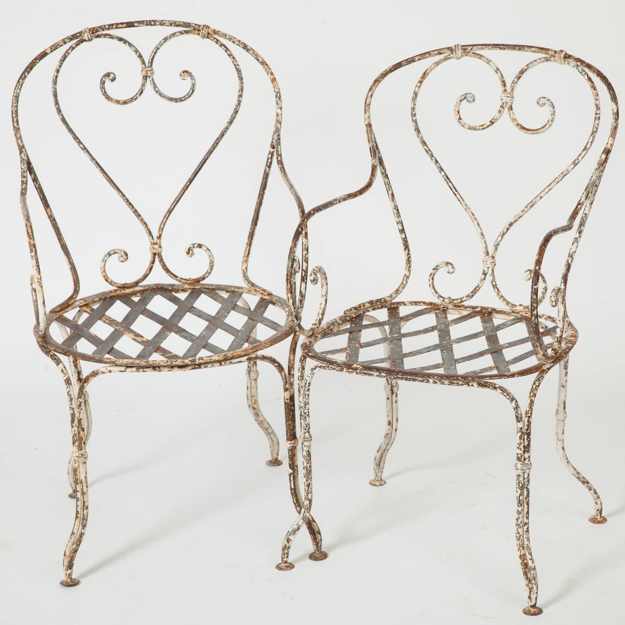 A set of six French Antique Wrought Iron garden chairs circa 1900. at