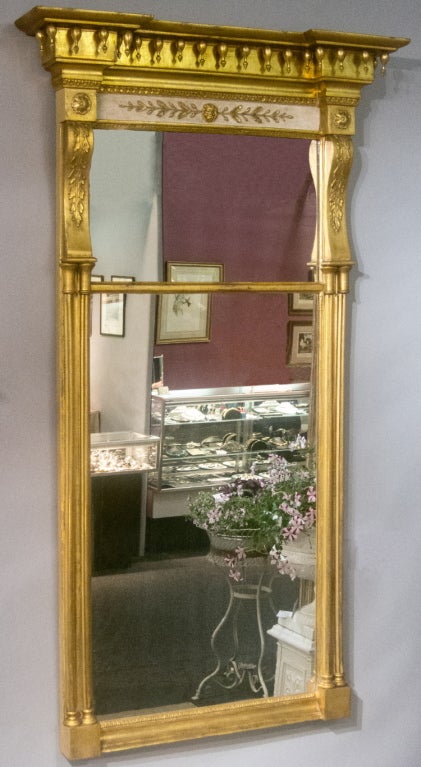 An American Federal giltwood constitution mirror. Double columns and unusual tear drop pendant decoration.