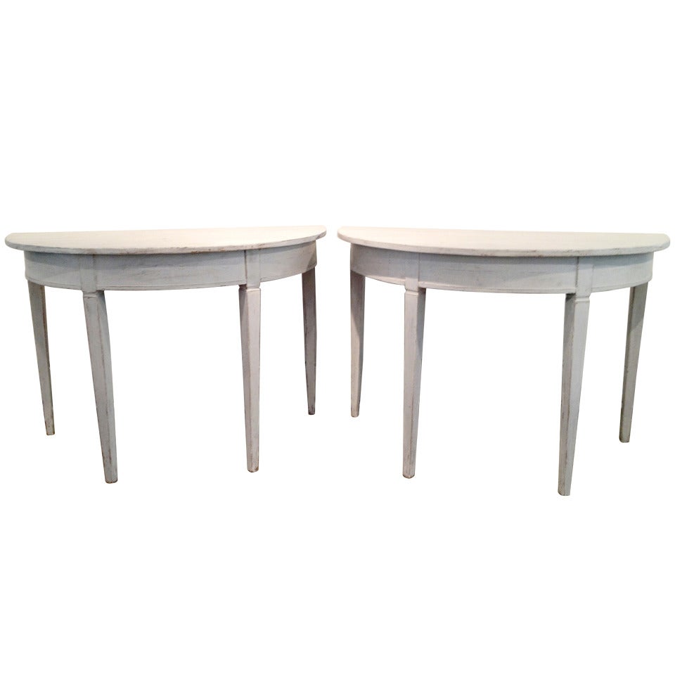 A pair of Swedish dem-lune tables