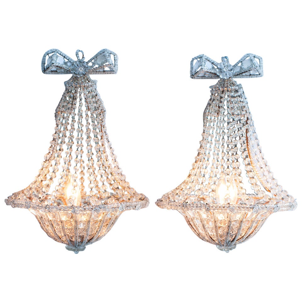 Pair of French Mirrored Sconces with Bow Detail, circa 1900