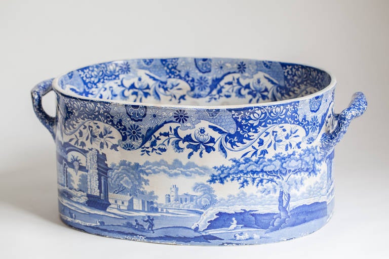 A rare and early English transferware footub in the Italian Pattern printed in a rich blue known as British Cobalt blue. It dates to 1820 and is attributed to John Mare. The transfer and color on the outside is perfect with no discolorations, the