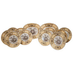 A set of ten yellow and brown transfer plates and two platters, 1840, England